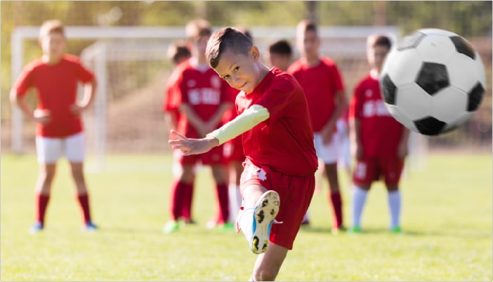 kid shooting during drill training