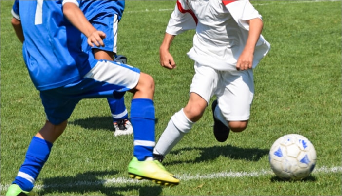 Kid showing agility skills during training